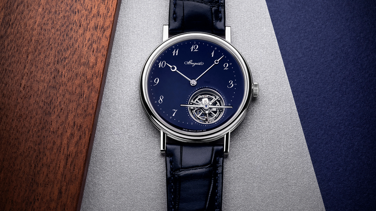 Classique Extra-Thin Self-Winding Tourbillon 5367 - Breguet adorns the dial of its Extra-Thin Self-Winding Tourbillon with a touch of deep blue, by using the traditional grand feu enamel technique. There are a limited number of artisans still capable of mastering this age-old process, which was dear to Abraham-Louis Breguet, as he appreciated the spotless aspect it conferred on watches. Not surprising, given that he had revolutionised watchmaking aesthetics by ridding watches of heavy and superfluous decoration. Today, Breguet keeps this art alive with a workshop entirely dedicated to enamelling.